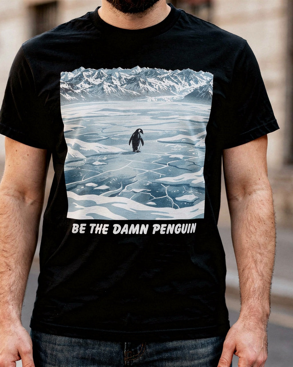 Be the Damn Penguin black graphic T-shirt worn with a streetwear outfit