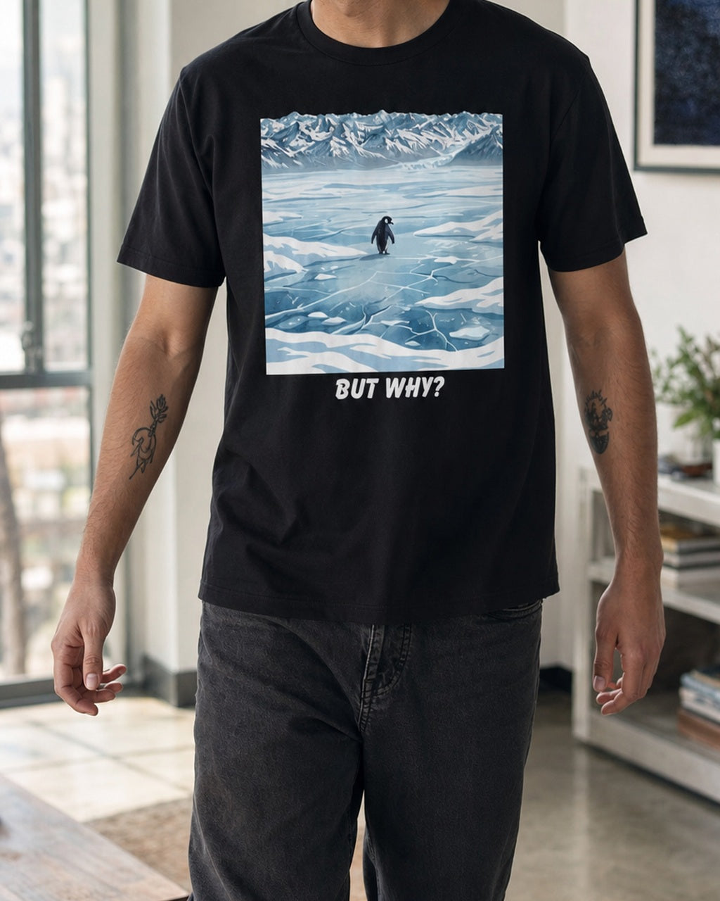 But Why Penguin black graphic tee worn in a relaxed indoor look
