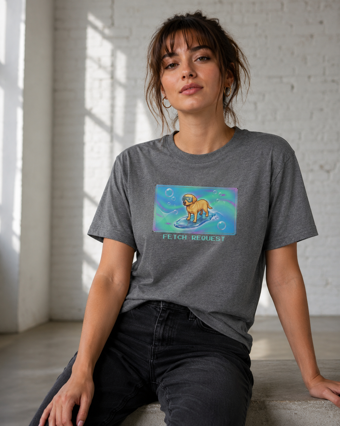 O's Tees Fetch Request Labrador Retriever Frutiger Aero Dogs graphic tee lifestyle image — Graphite Heather shirt, female shot 03, no-phone editorial