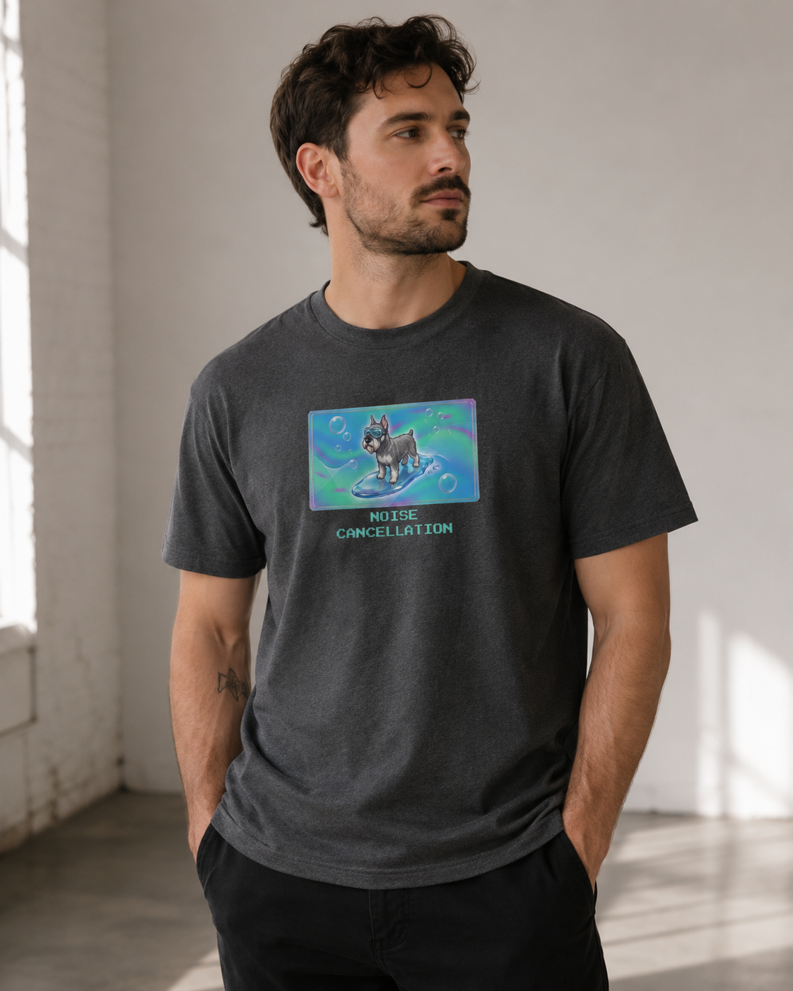 O's Tees Noise Cancellation Miniature Schnauzer Frutiger Aero Dogs graphic tee lifestyle image — Dark Heather shirt, male shot 03, no-phone editorial