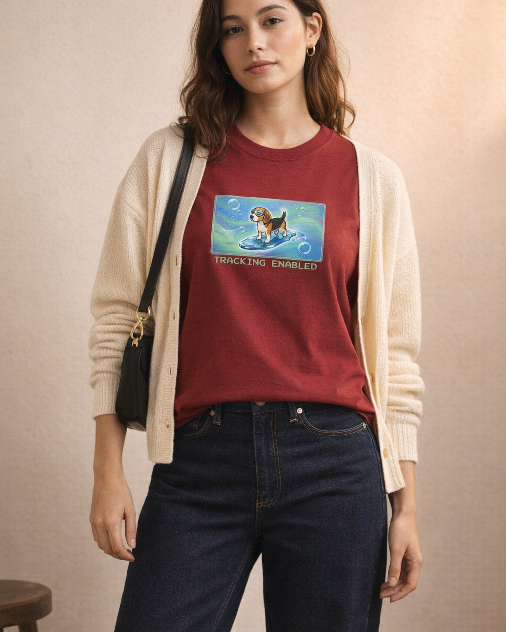 O's Tees Tracking Enabled Beagle Frutiger Aero Dogs graphic tee lifestyle image — Cardinal Red shirt, female shot 01, dark indigo cream cardigan
