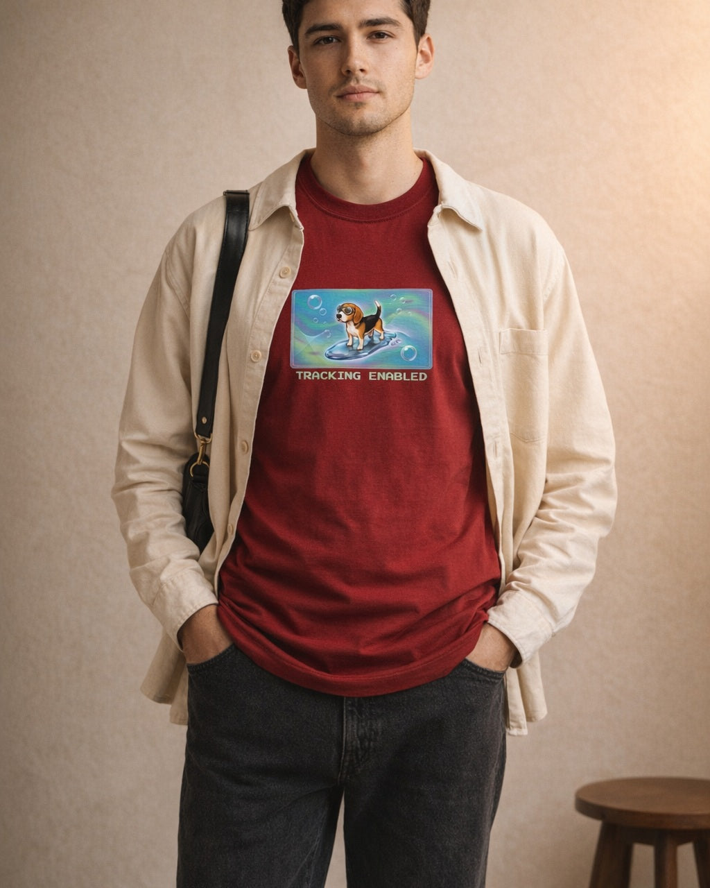 O's Tees Tracking Enabled Beagle Frutiger Aero Dogs graphic tee lifestyle image — Cardinal Red shirt, male shot 02, black jeans cream overshirt