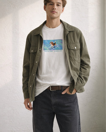 O's Tees Tracking Enabled Beagle Frutiger Aero Dogs graphic tee lifestyle image — White shirt, male shot 01, black denim field jacket