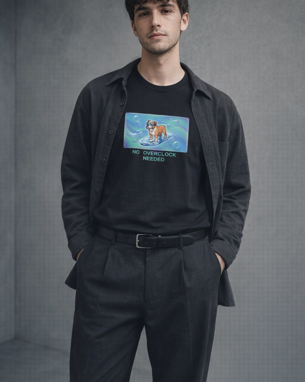 O's Tees No Overclock Needed Bulldog Frutiger Aero Dogs graphic tee lifestyle image — Black shirt, male shot 01, charcoal pleated trouser