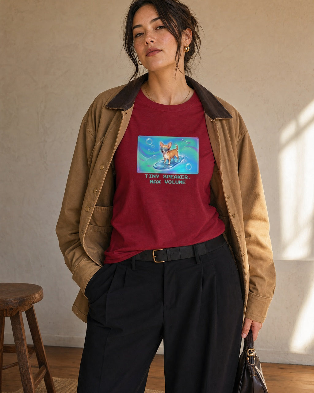 O's Tees Tiny Speaker, Max Volume Chihuahua Frutiger Aero Dogs graphic tee lifestyle image — Cardinal Red shirt, female shot 02, black trouser camel jacket