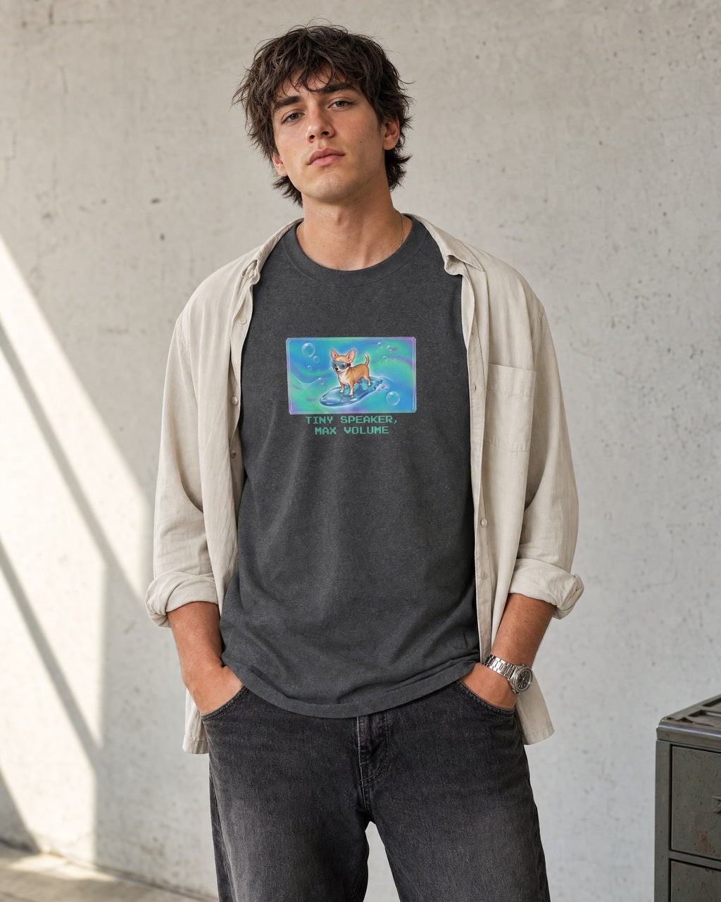 O's Tees Tiny Speaker, Max Volume Chihuahua Frutiger Aero Dogs graphic tee lifestyle image — Dark Heather shirt, male shot 02, faded black denim stone overshirt