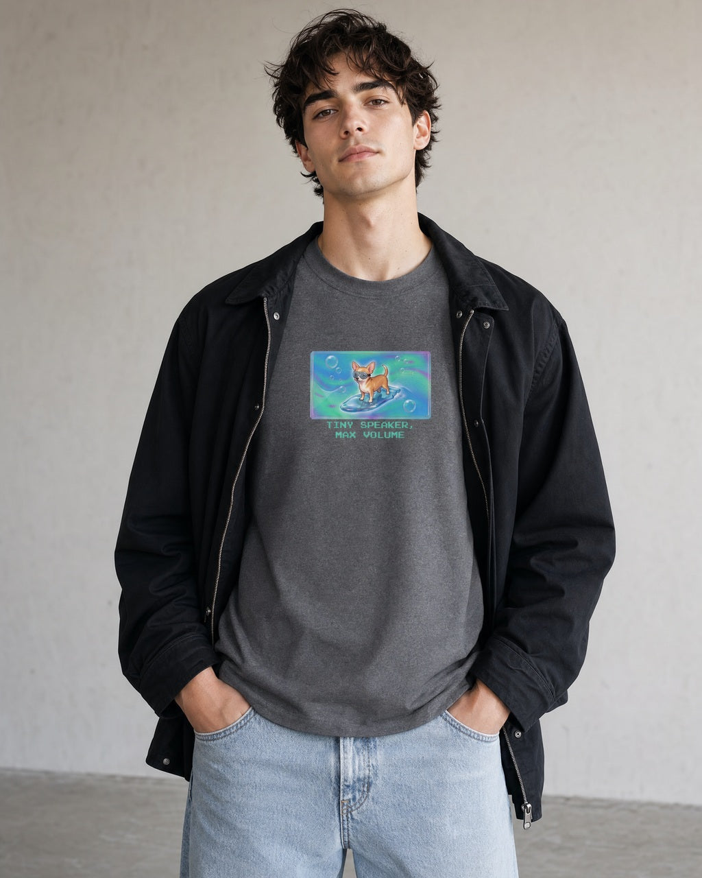 O's Tees Tiny Speaker, Max Volume Chihuahua Frutiger Aero Dogs graphic tee lifestyle image — Graphite Heather shirt, male shot 02, light denim black field