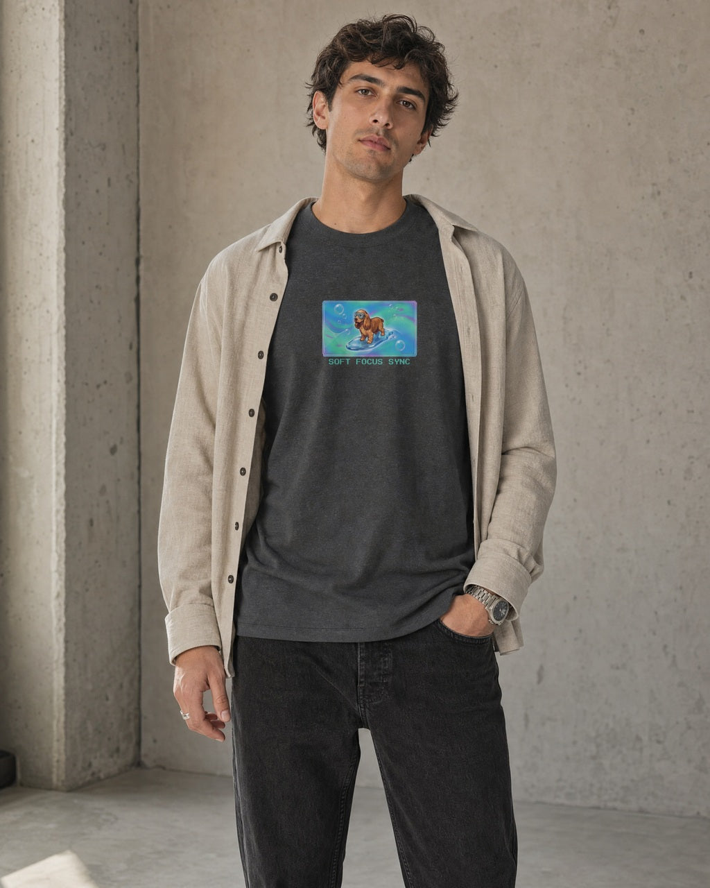 O's Tees Soft Focus Sync Cocker Spaniel Frutiger Aero Dogs graphic tee lifestyle image — Dark Heather shirt, male shot 02, faded black denim stone overshirt