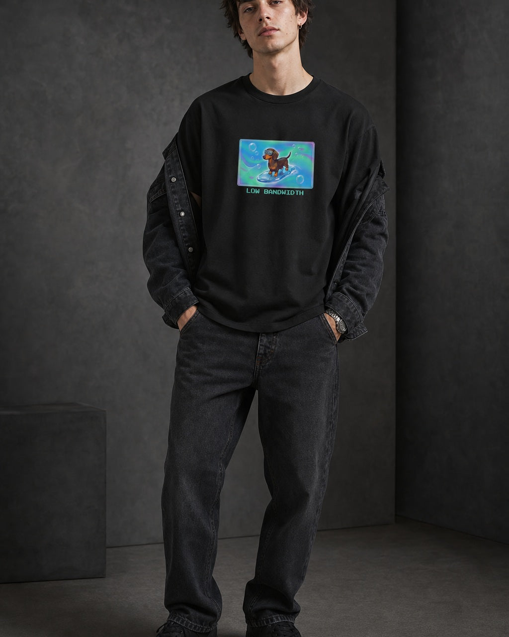 O's Tees Low Bandwidth Dachshund Frutiger Aero Dogs graphic tee lifestyle image — Black shirt, male shot 02, washed black double denim
