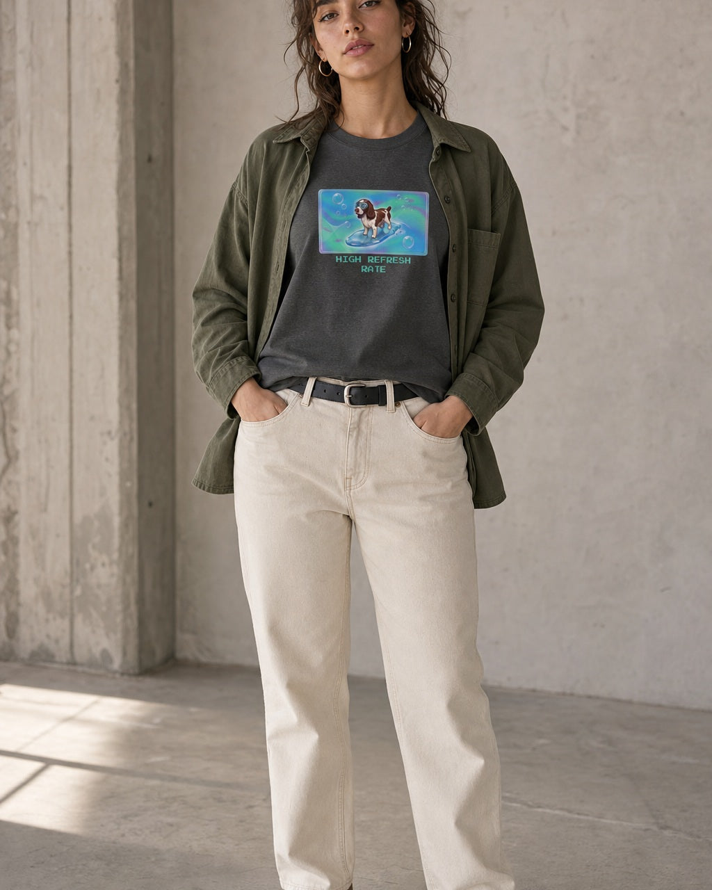O's Tees High Refresh Rate English Springer Spaniel Frutiger Aero Dogs graphic tee lifestyle image — Dark Heather shirt, female shot 01, ecru denim olive overshirt