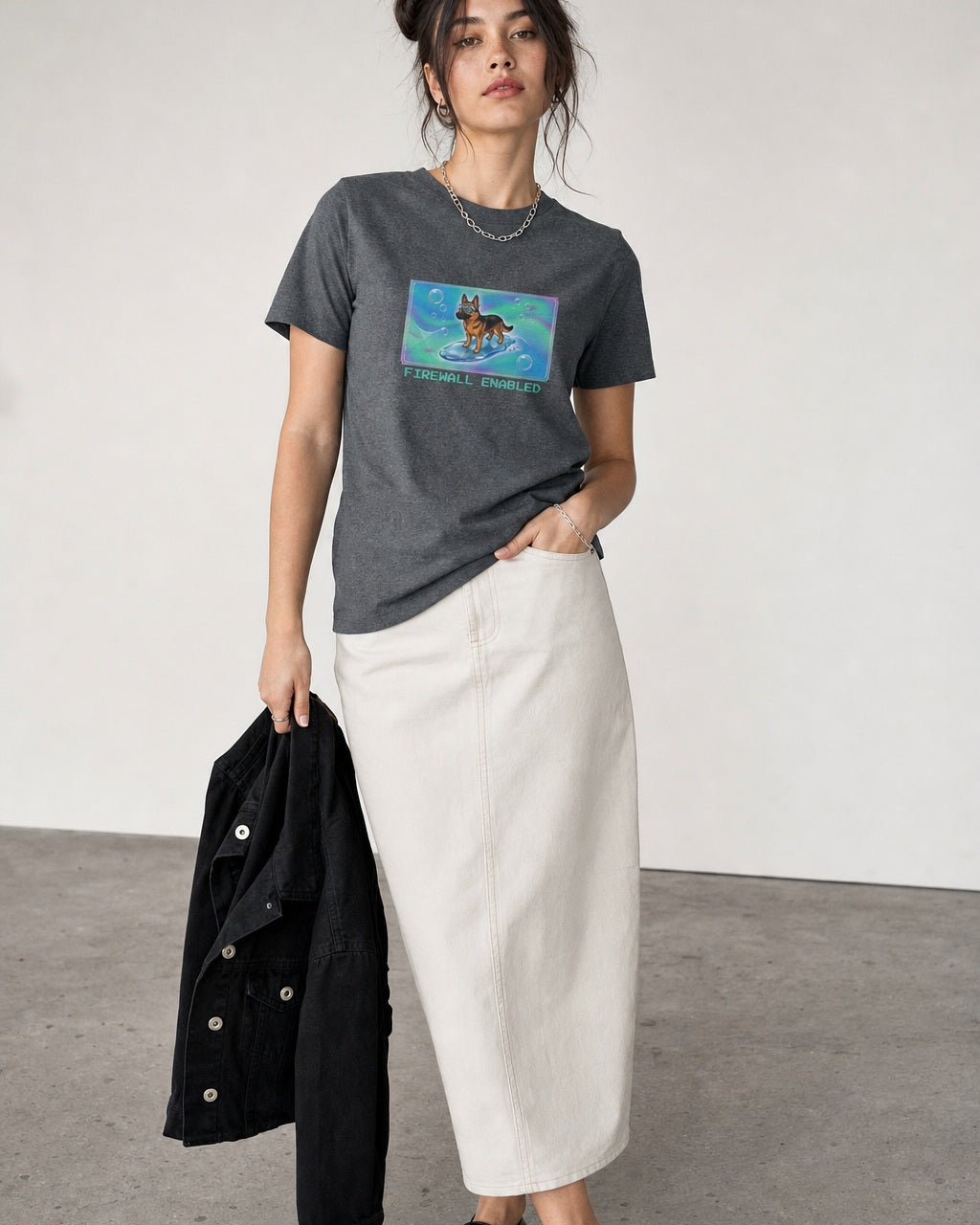 O's Tees Firewall Enabled German Shepherd Frutiger Aero Dogs graphic tee lifestyle image — Graphite Heather shirt, female shot 02, stone column skirt black jacket