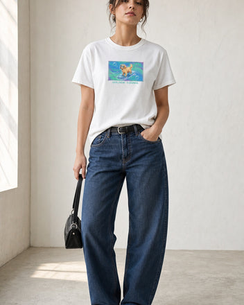 O's Tees Golden Signal Golden Retriever Frutiger Aero Dogs graphic tee lifestyle image — White shirt, female shot 01, barrel denim mary jane