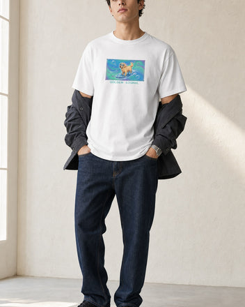 O's Tees Golden Signal Golden Retriever Frutiger Aero Dogs graphic tee lifestyle image — White shirt, male shot 02, indigo workwear
