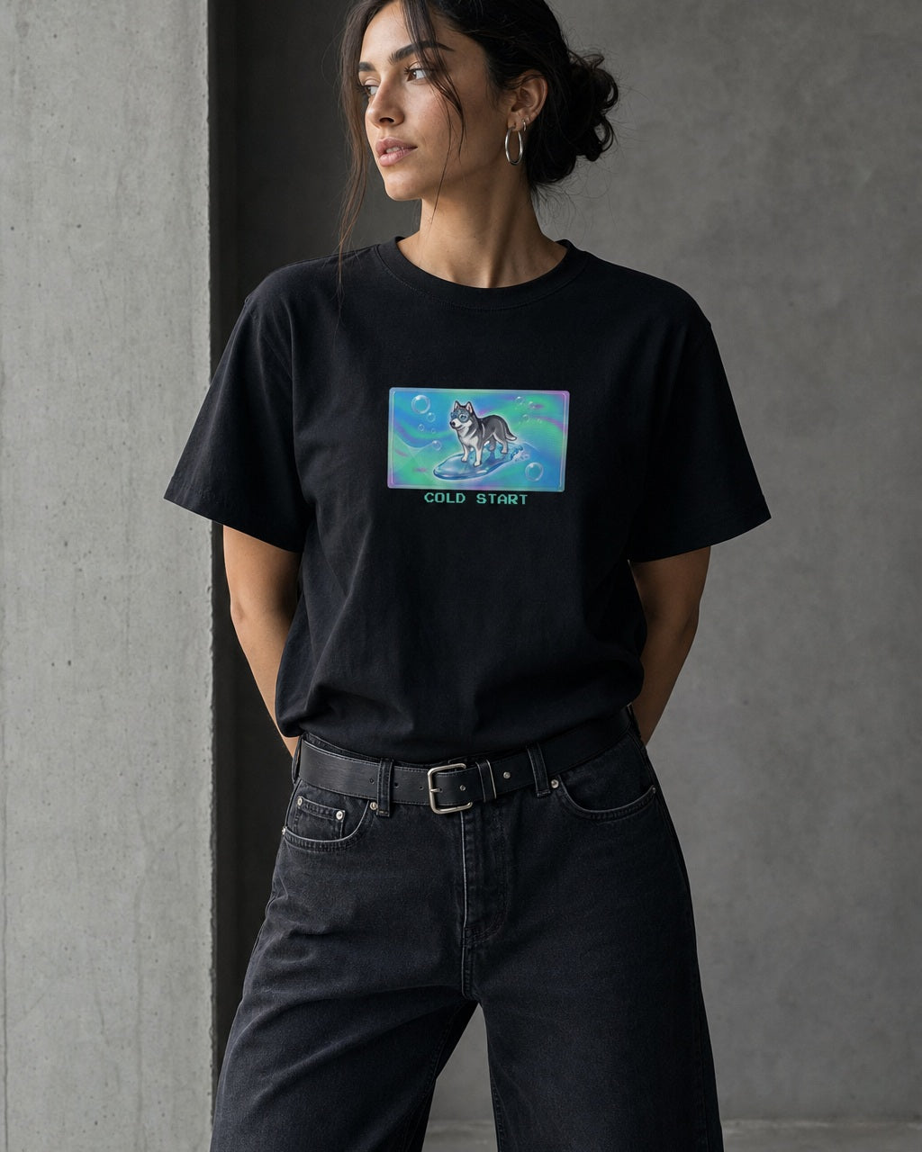 O's Tees Cold Start Husky Frutiger Aero Dogs graphic tee lifestyle image — Black shirt, female shot 01, washed black denim