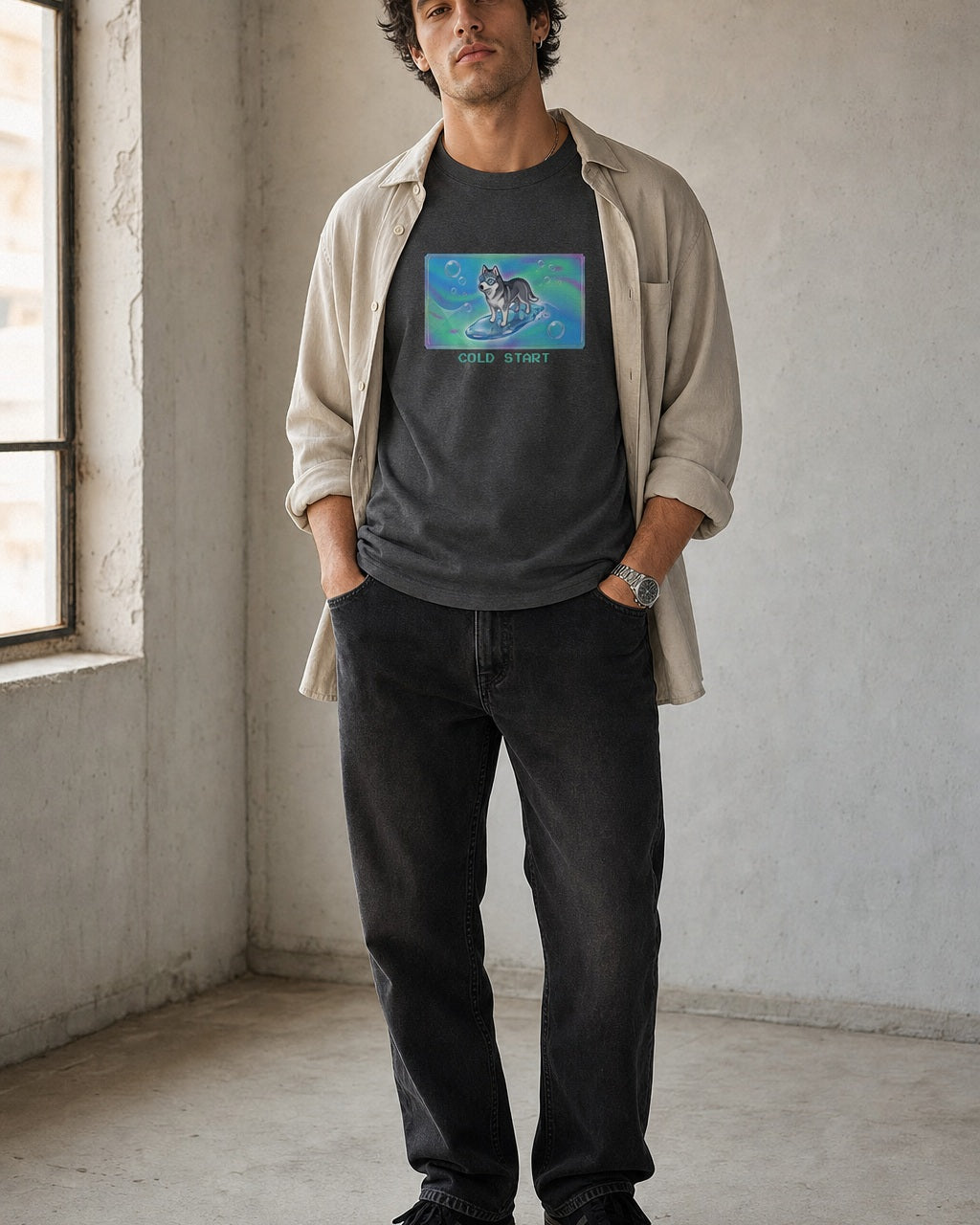 O's Tees Cold Start Husky Frutiger Aero Dogs graphic tee lifestyle image — Dark Heather shirt, male shot 02, faded black denim stone overshirt